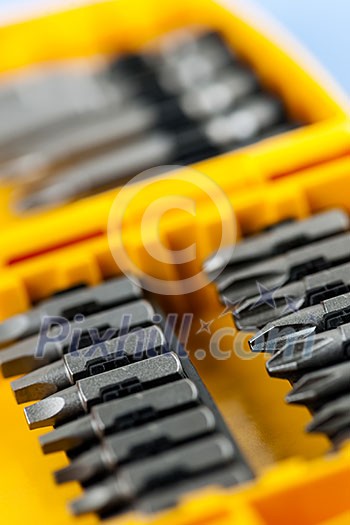 Closeup on phillips and robertson screwdriver insert bits of various sizes