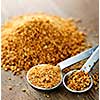 Organic coconut palm sugar in measuring spoons