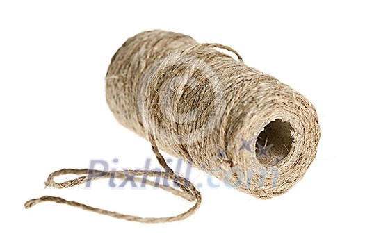 Spool of brown rough twine isolated on white background