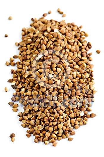 Buckwheat seeds closeup isolated on white background Buckwheat seeds closeup isolated on white background