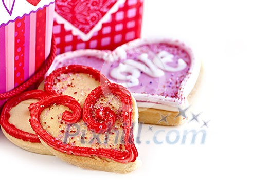 Homemade baked shortbread Valentine cookies with icing and gift boxes