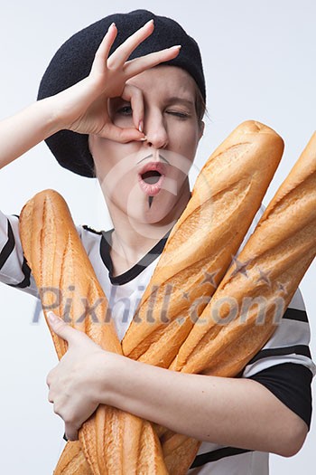 woman holding baguettes isolated with ok sign on white woman holding baguettes isolated with ok sign on white