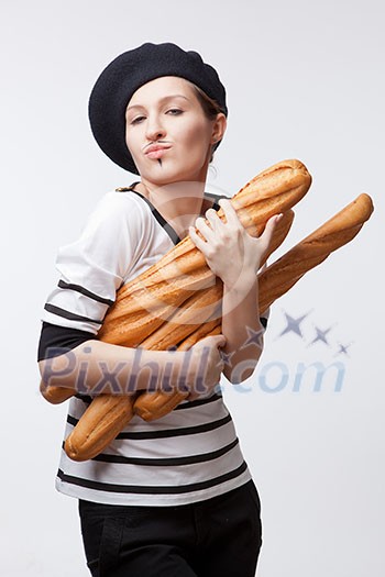 woman holding baguettes isolated on white