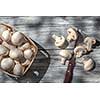 Mushrooms on wooden table, top view image