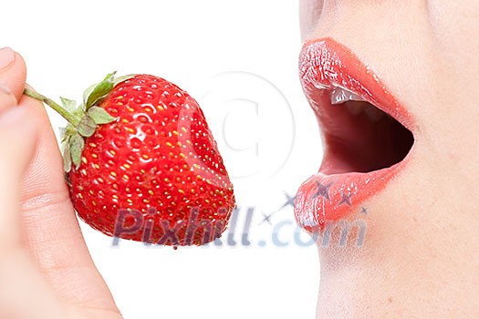 Young woman holding strawberry isolated on white