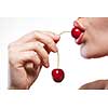 Young woman with cherry isolated on white