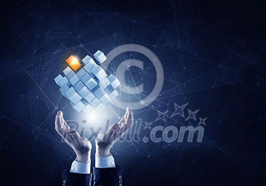 Businessman hand shows cube as symbol of problem solving Businessman hand shows cube as symbol of problem solving