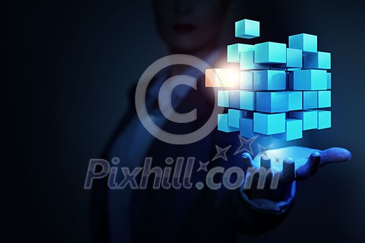 Businesswoman hand shows cube as symbol of problem solving Businesswoman hand shows cube as symbol of problem solving