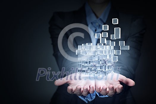 Businesswoman hand shows cube as symbol of problem solving Businesswoman hand shows cube as symbol of problem solving