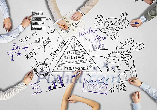 Top view of people hands drawing business teamwork strategy Top view of people hands drawing business teamwork strategy