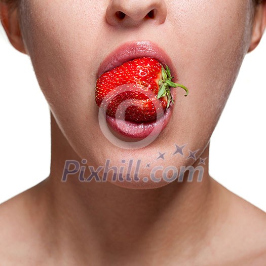 Young woman biting strawberry isolated on white Young woman biting strawberry isolated on white