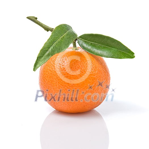 Tangerine with green leaves isolated on white Tangerine with green leaves isolated on white