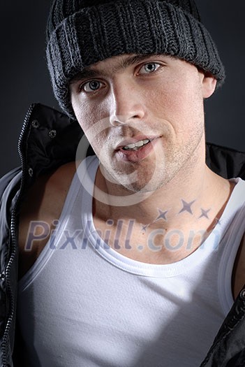 fashion portrait of young smiling man in hat fashion portrait of young smiling man in hat