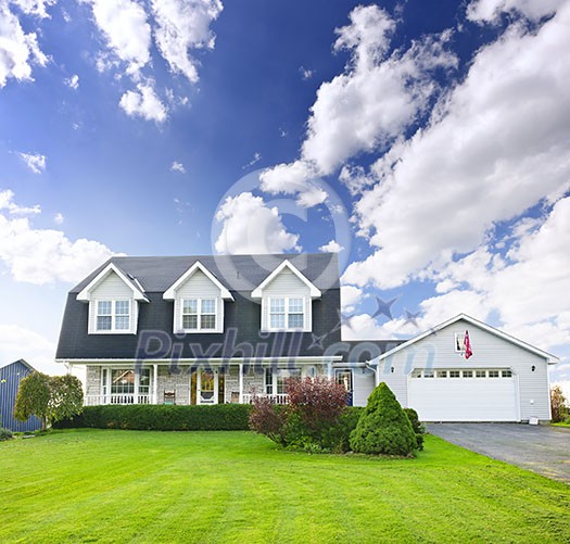 Beautiful two storey residential house with dormers and attached garage