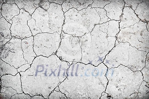 Background of dry cracked soil dirt or earth during drought