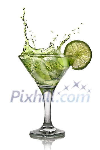 Green alcohol cocktail with splash and green lime isolated on white