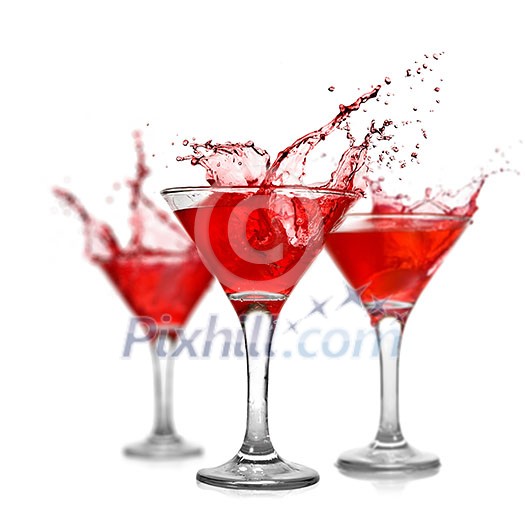 Red cocktails with splash isolated on white