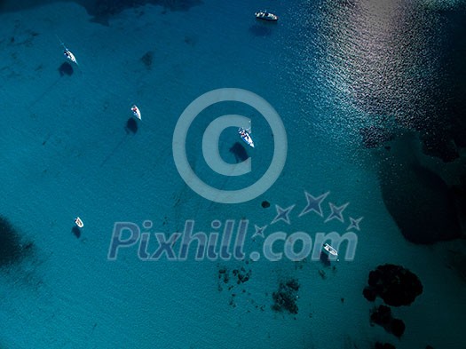 Aerial view of boats in a splendid cove in Corsica