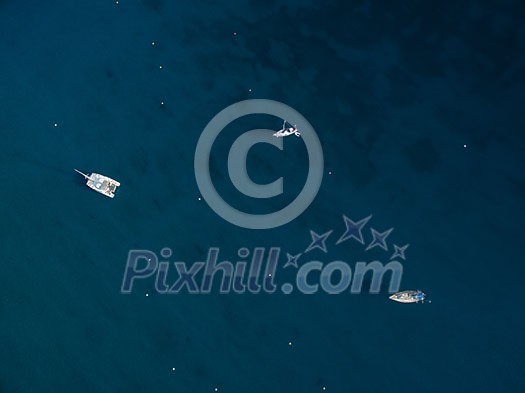 Aerial view of boats in a splendid cove in Corsica Aerial view of boats in a splendid cove in Corsica