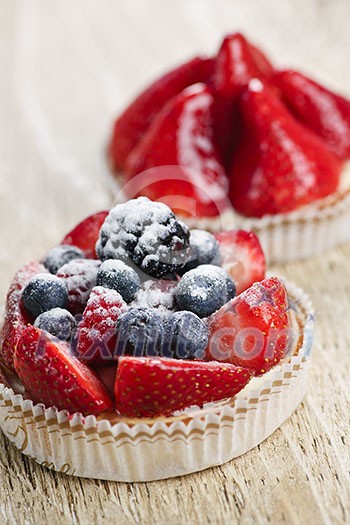 Closeup of fancy gourmet fresh fruit dessert tarts
