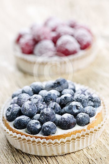 Closeup of fancy gourmet fresh berry dessert tarts