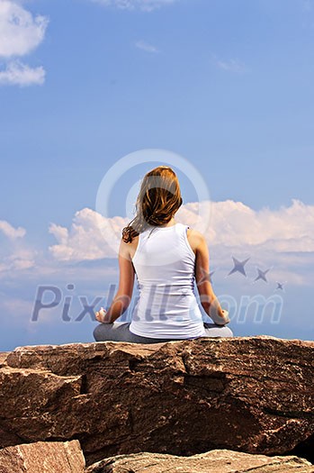 Portrait of young teenage girl doing yoga