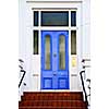 Blue front door with brass knocker in London England