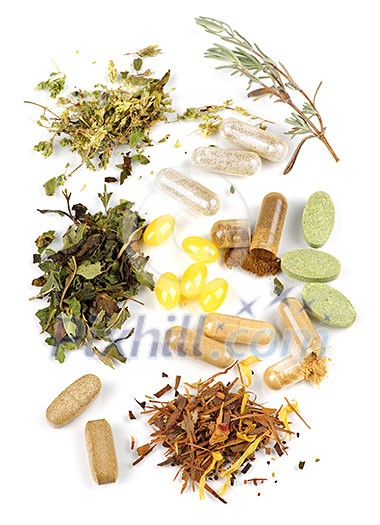 Herbs, herbal supplements and vitamin pills on white background Herbs, herbal supplements and vitamin pills on white background