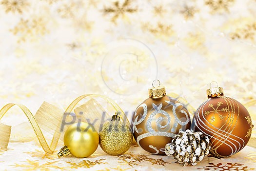 Golden Christmas background with gold balls and ornaments