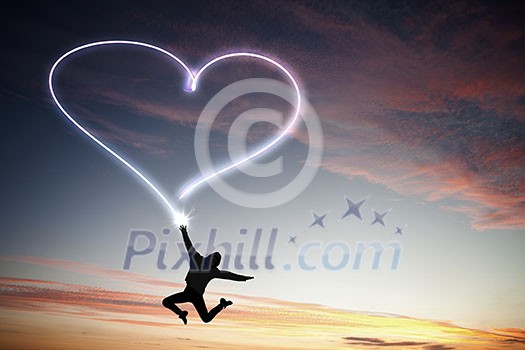 Young girl jumping high in sky and drawing love sign