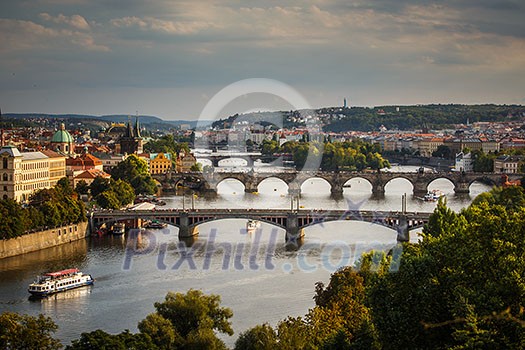 Prague with its splendid bridges over the Vltava river, city sunset panorama, Czech Republic