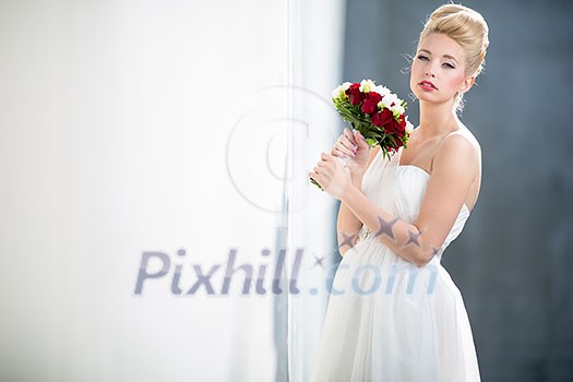 Gorgeous bride on her wedding day (color toned image; shallow DOF)