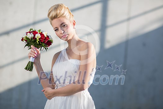 Gorgeous bride on her wedding day (color toned image; shallow DOF)