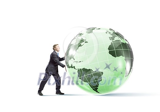 Determined businessman pushing big digital Earth planet Determined businessman pushing big digital Earth planet