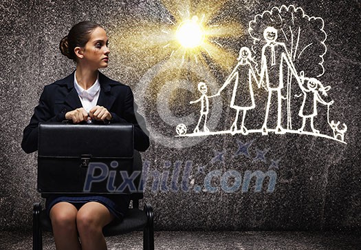 Young upset businesswoman sitting on chair with briefcase Young upset businesswoman sitting on chair with briefcase