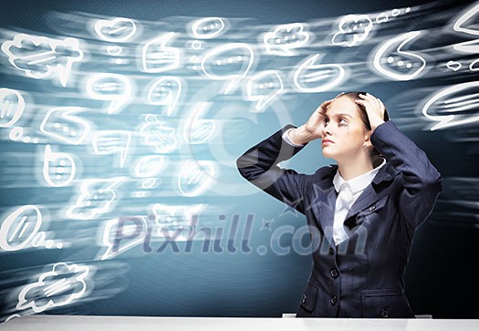Troubled crying businesswoman with hands on head Troubled crying businesswoman with hands on head