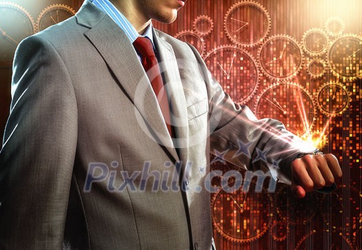 Close up of businessman looking at watch at his wrist Close up of businessman looking at watch at his wrist