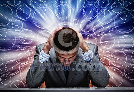 Troubled thoughtful businessman with hands on head