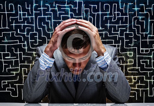 Troubled thoughtful businessman with hands on head Troubled thoughtful businessman with hands on head