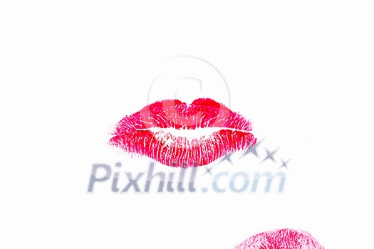 Woman's lipstick mark of kiss on white background