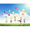 Group of happy children playing with colorful balloons