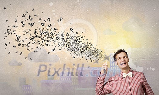 Young funny man in bow tie talking on mobile phone