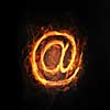 Glowing light email symbol on dark background