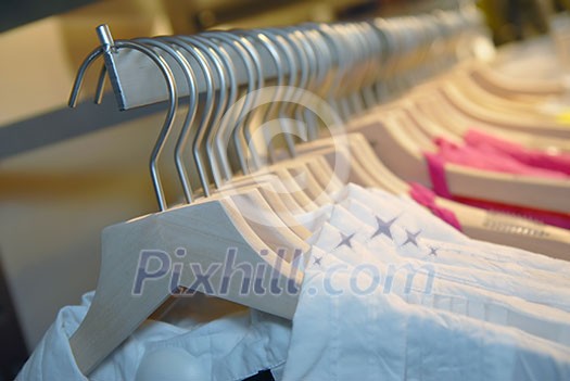 clothes on racks in store clothes on racks in store