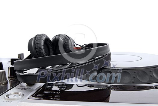 dj mixer with headphones isolated on white dj mixer with headphones isolated on white