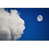 moon and clouds on the blue sky