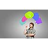 Young thoughtful man and colorful speech bubbles above