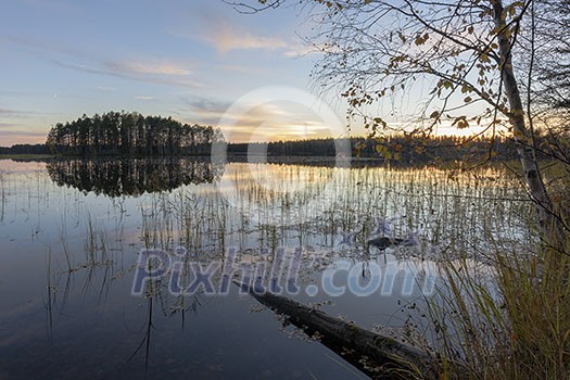 Calm lake scenery in autumn colors Calm lake scenery in autumn colors