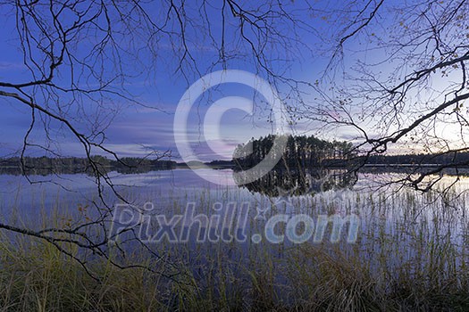 Calm lake scenery in autumn colors Calm lake scenery in autumn colors