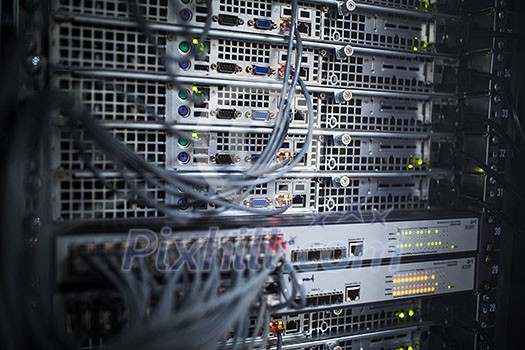 Server rack cluster in a data center (shallow DOF; color toned image)